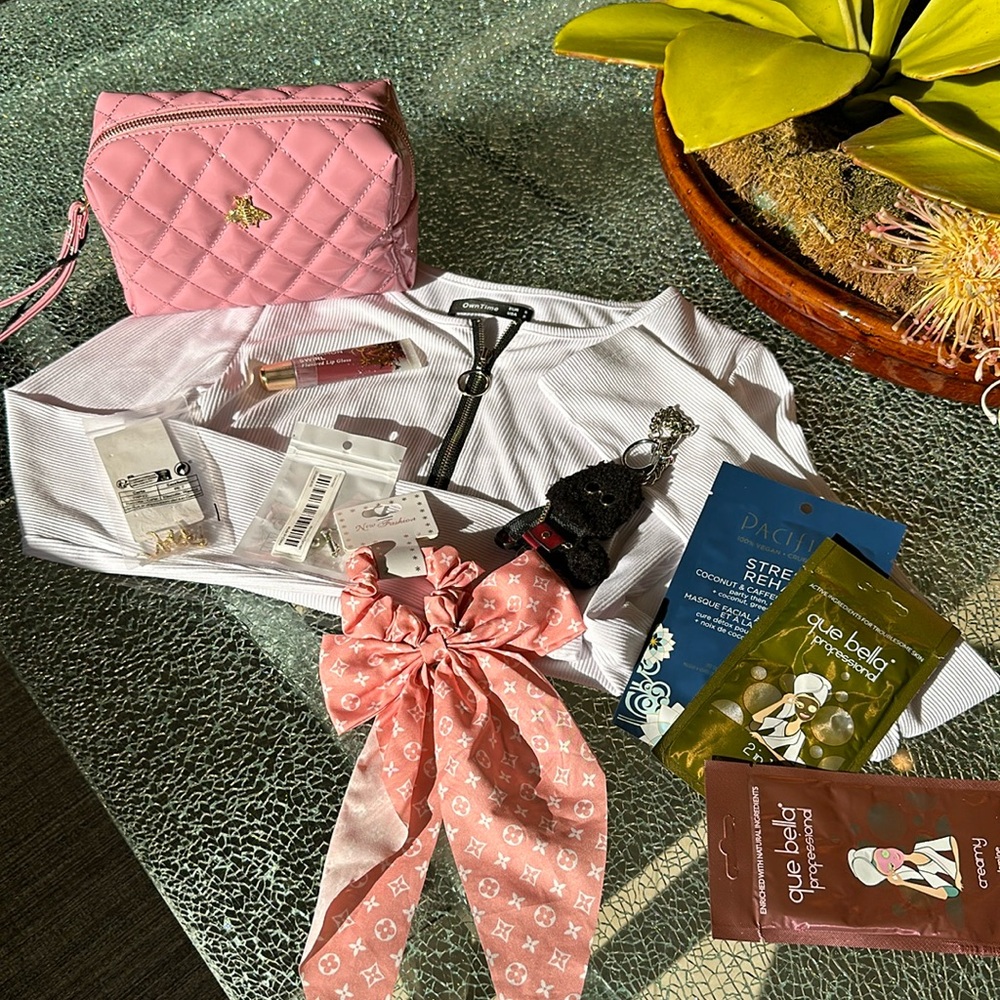 PERFECT GIFT BUNDLE. PINK CASE FILLED TO THE BRIM. HAIR TIE, FACE MASKS TOP ETC